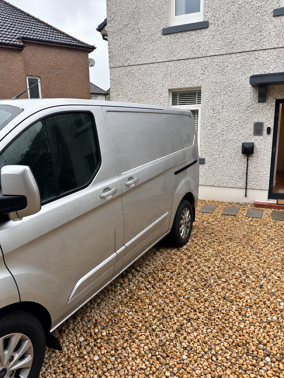 EV charger installed beside a customer driveway in the West of Scotland